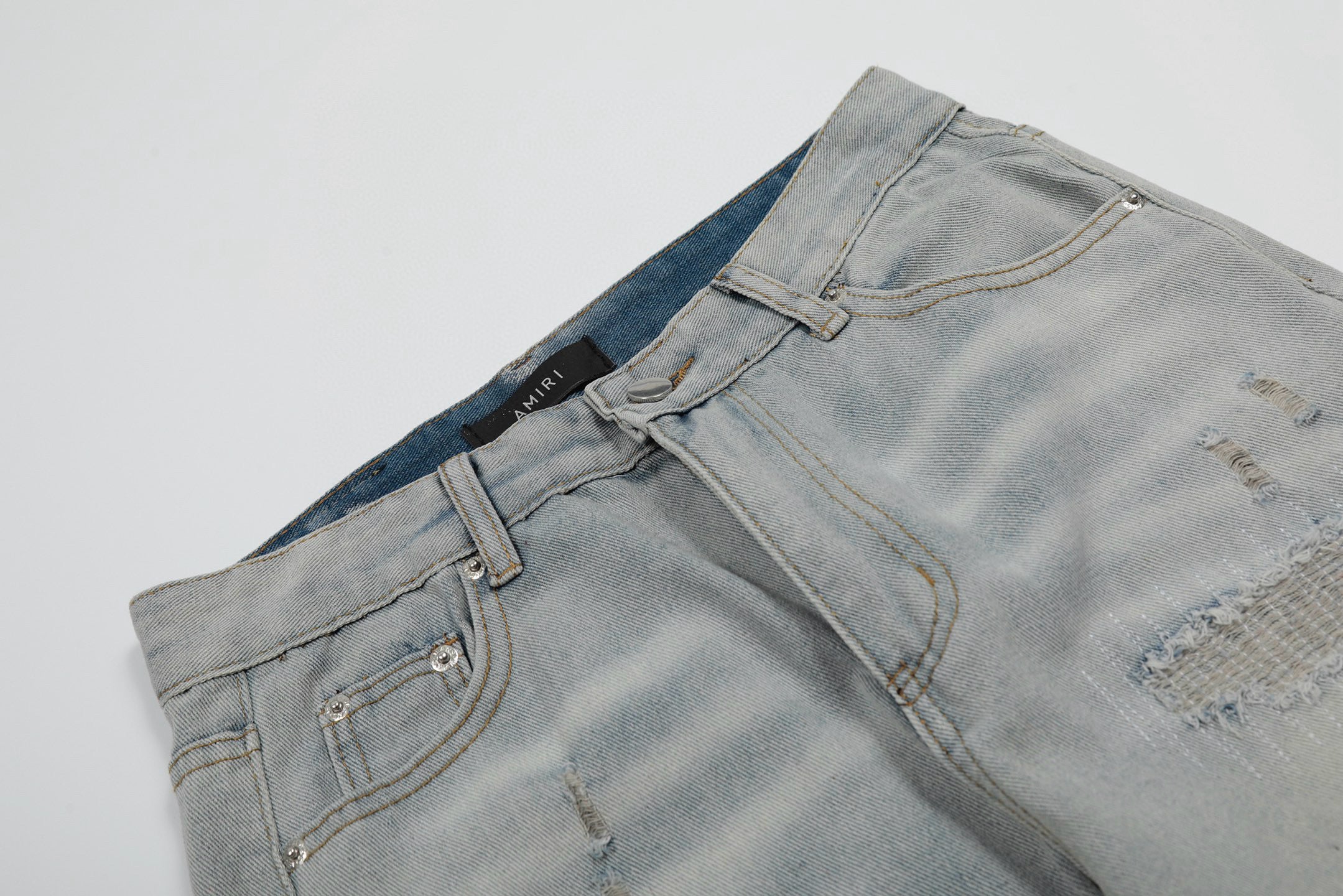 Amiri | MX1 Leather Patch Distressed Jeans | Indigo