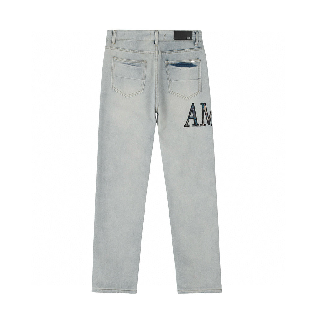 Amiri | MX1 Leather Patch Distressed Jeans | Indigo