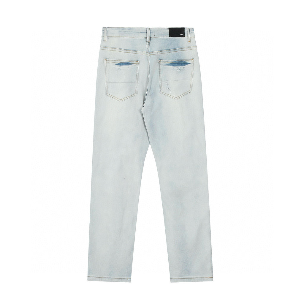 Amiri | MX1 Leather Patch Distressed Jeans | Indigo