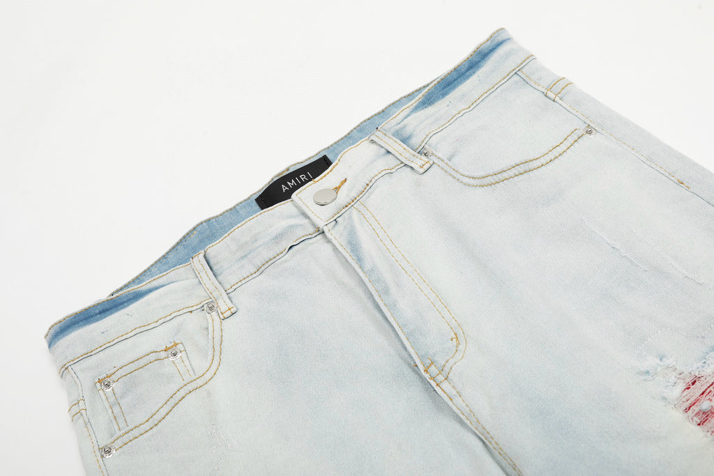 Amiri | MX1 Leather Patch Distressed Jeans | Indigo