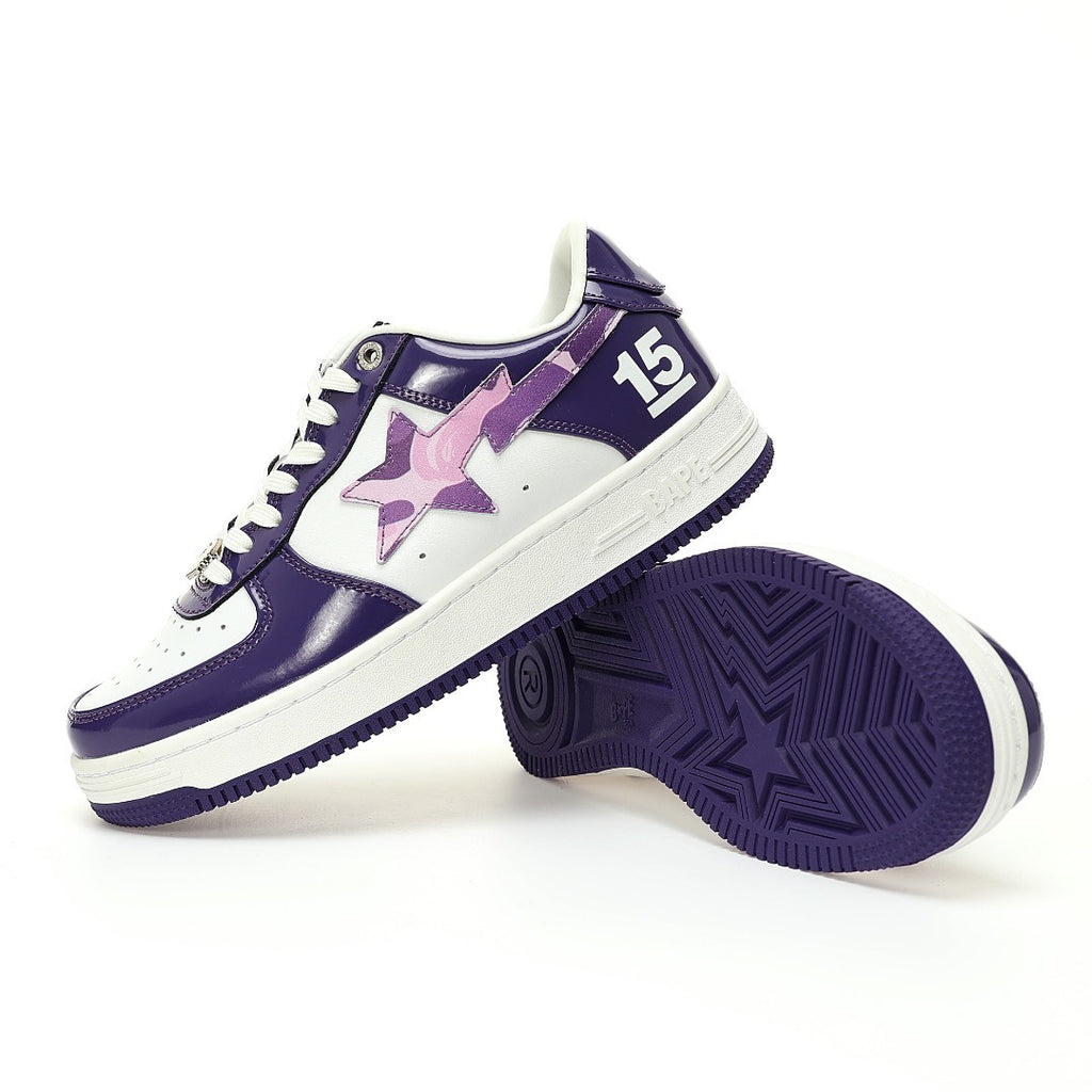 Purple and white sneakers with star design on a white background