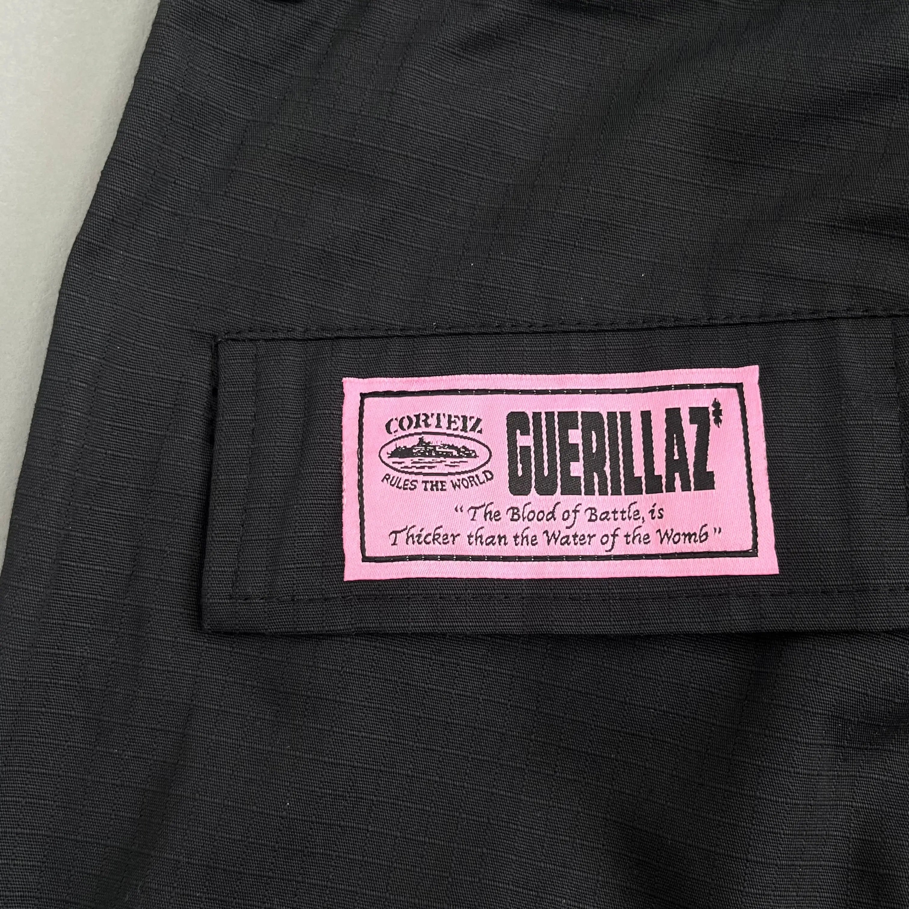 Corteiz | Black Cargo Pants with Purple or Pink Patch UndergroundDesignerPlug