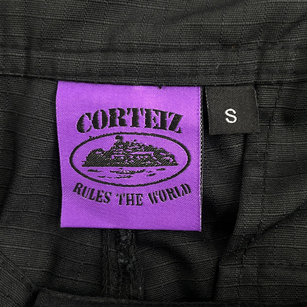 Corteiz | Black Cargo Pants with Purple or Pink Patch UndergroundDesignerPlug