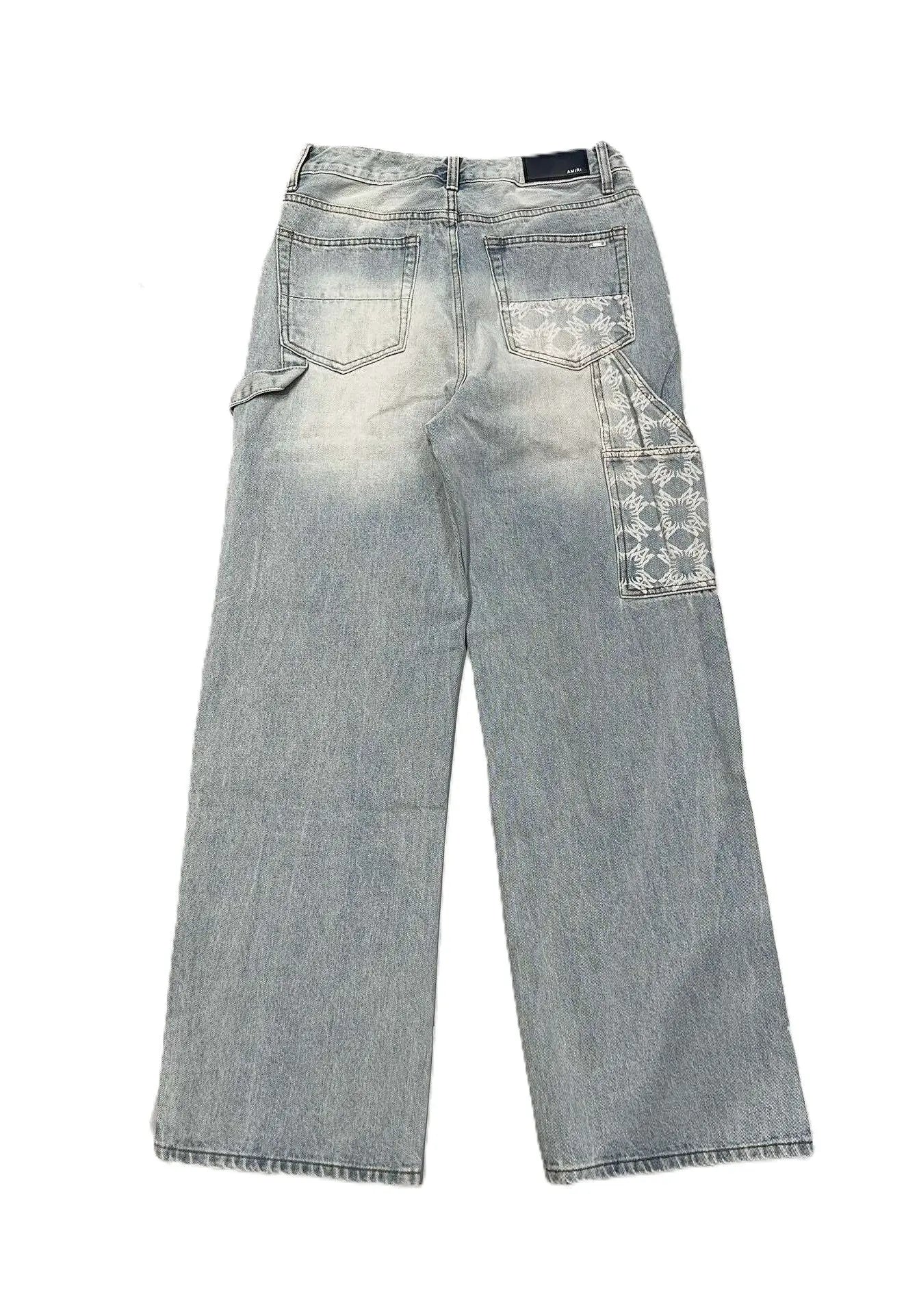 Amiri | Carpenter Monogram Panel Jeans | Light Wash Denim Amiri