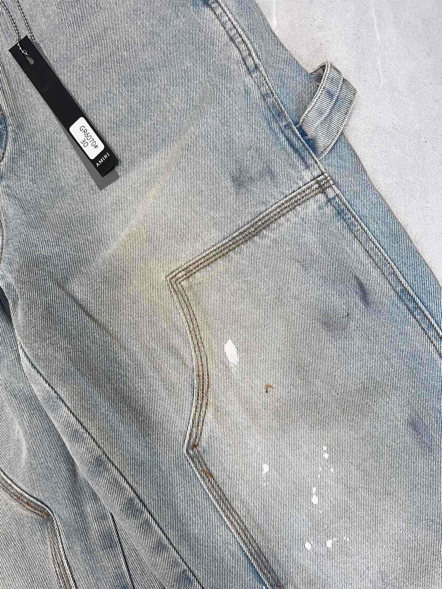 Amiri | Paint-Splatter Carpenter Jeans | Light Wash Denim Amiri
